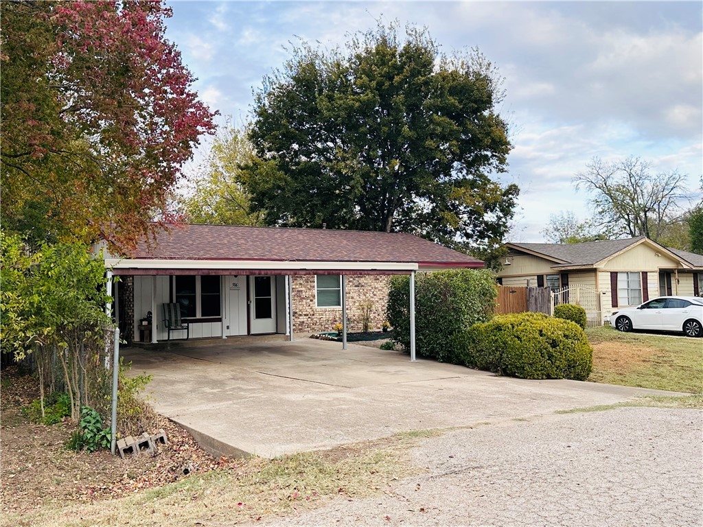 Single story home with a carport