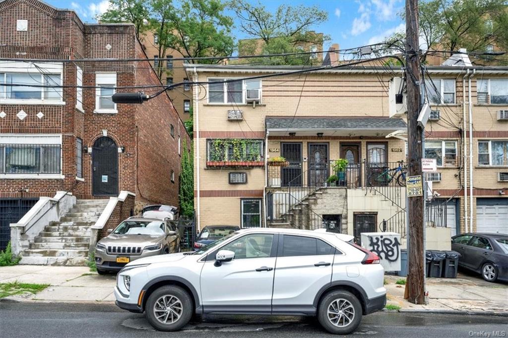 a car parked in front of a building