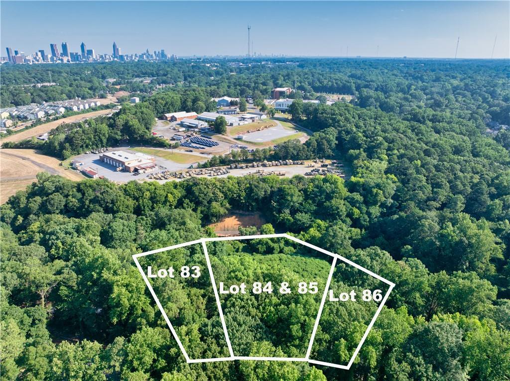 an aerial view of multiple house with a yard