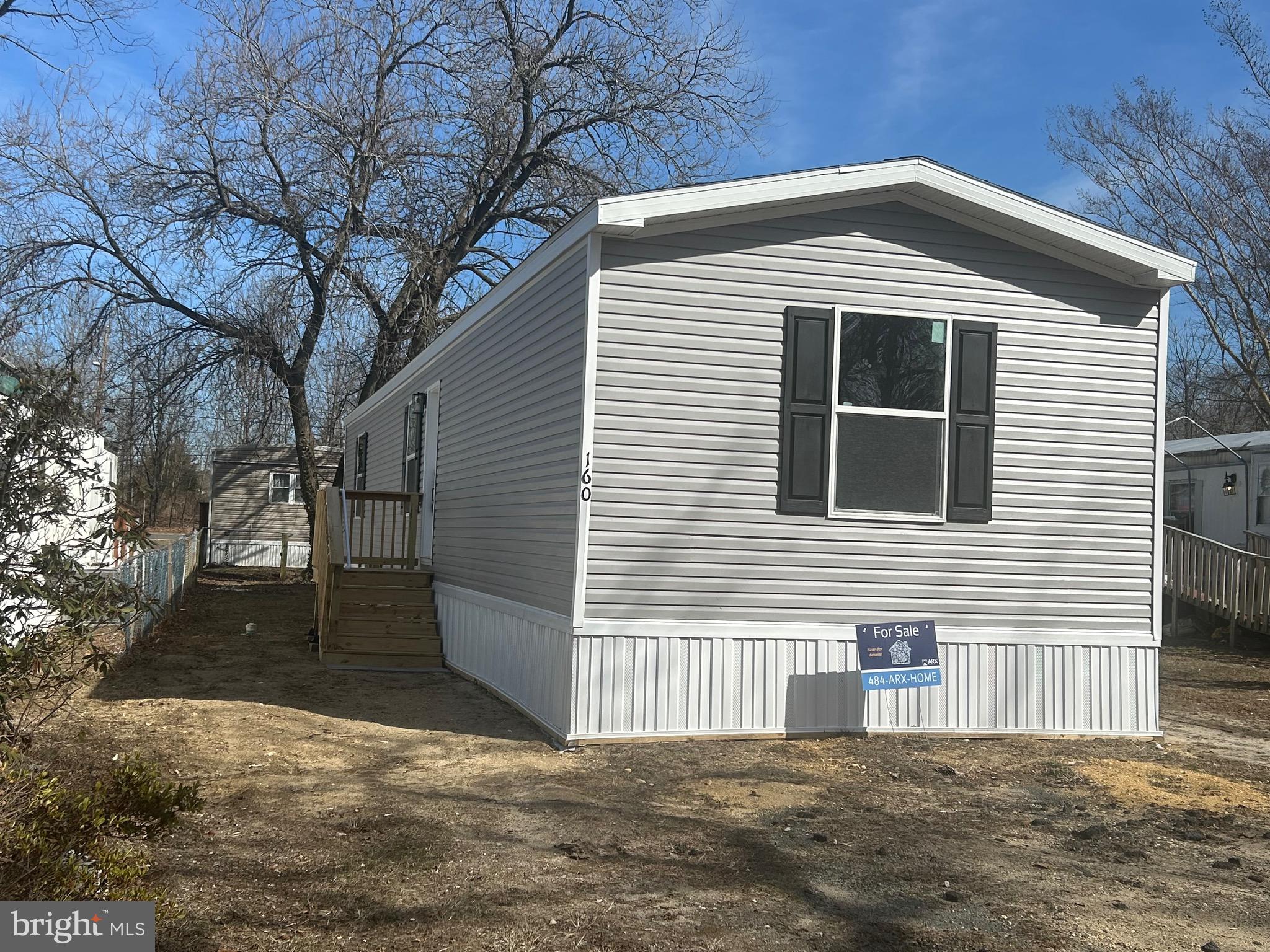 a front view of a house with a garage