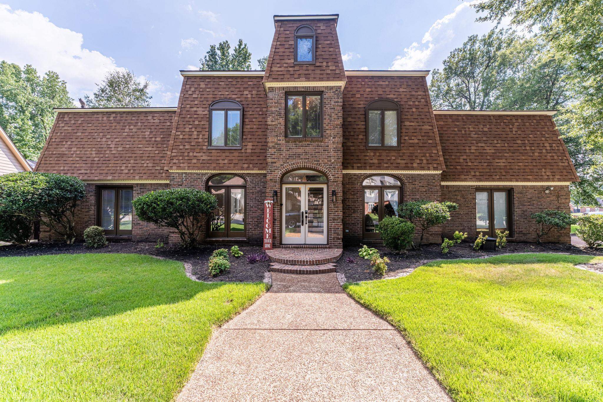 View of front of house with a front lawn