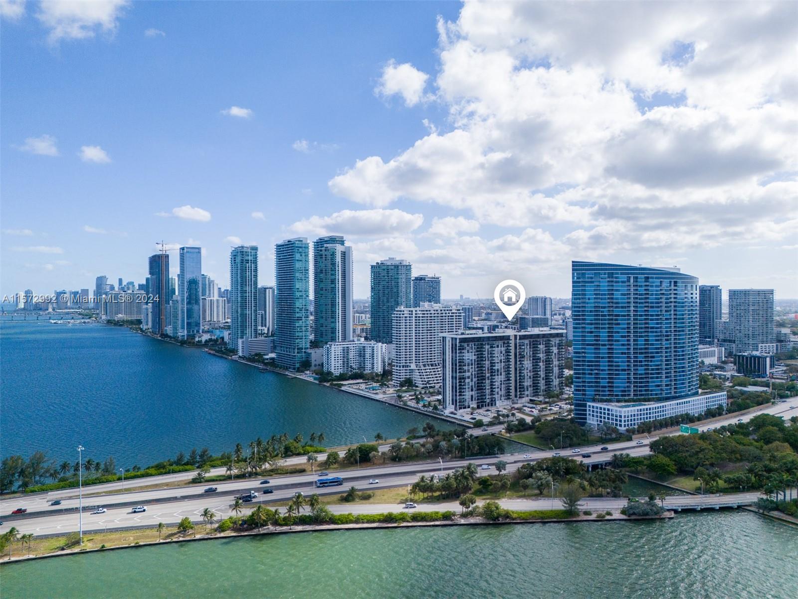 a view of a city with tall buildings