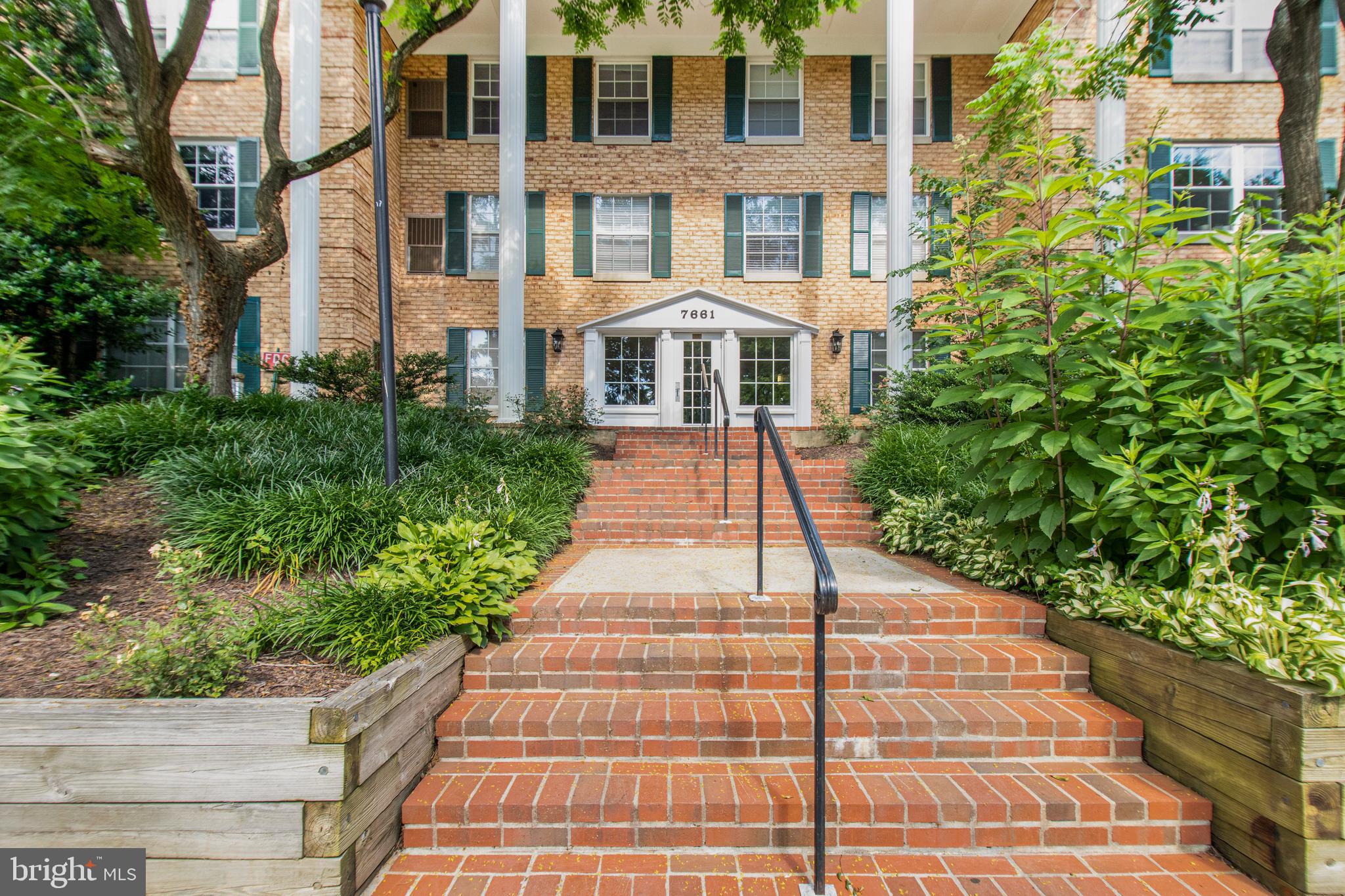 a front view of a multi story residential apartment building