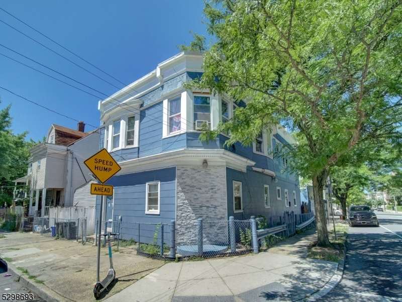 a front view of a house with street