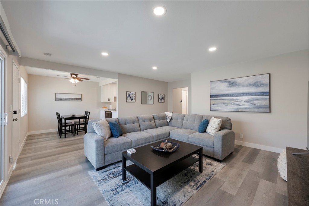 a living room with furniture and a table