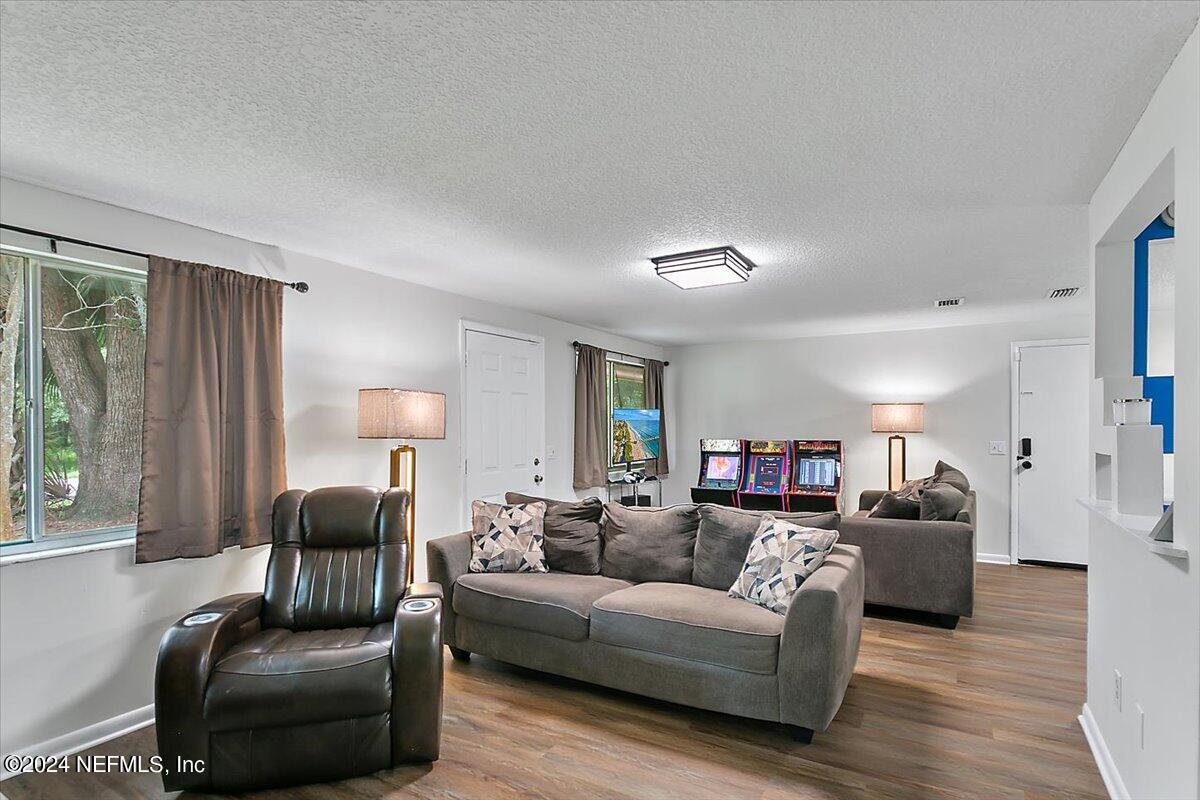 a living room with furniture and a couch