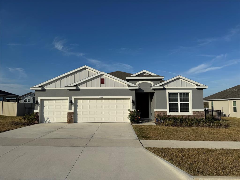 a front view of a house with yard