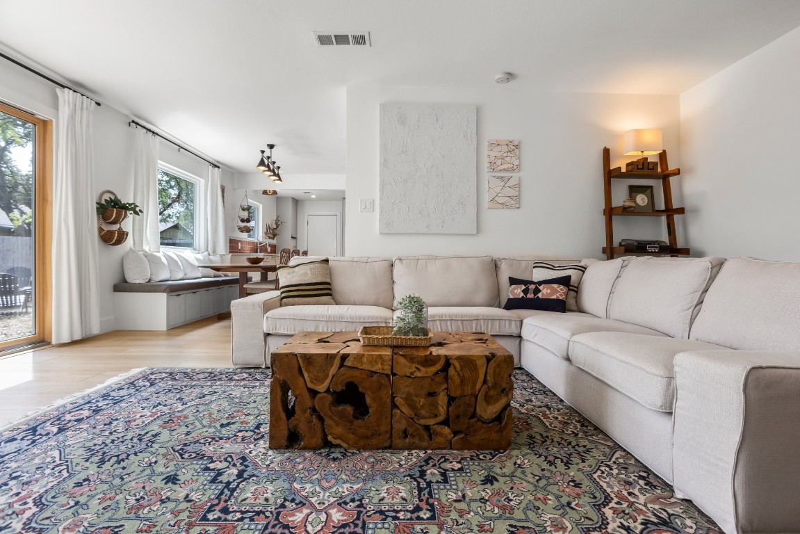 Kitchen opens up to the 2nd living room in this remodeled 2-story home.