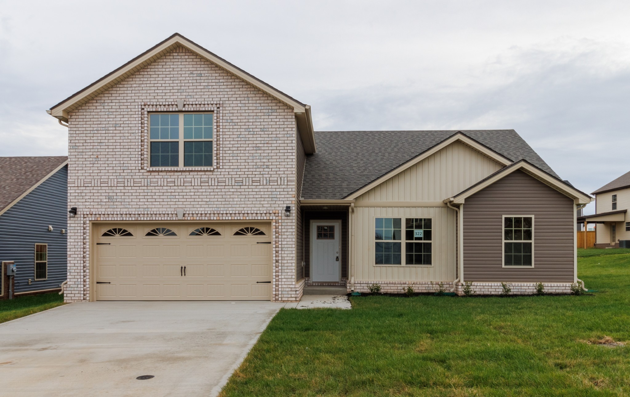 a view of a yard in front of a house