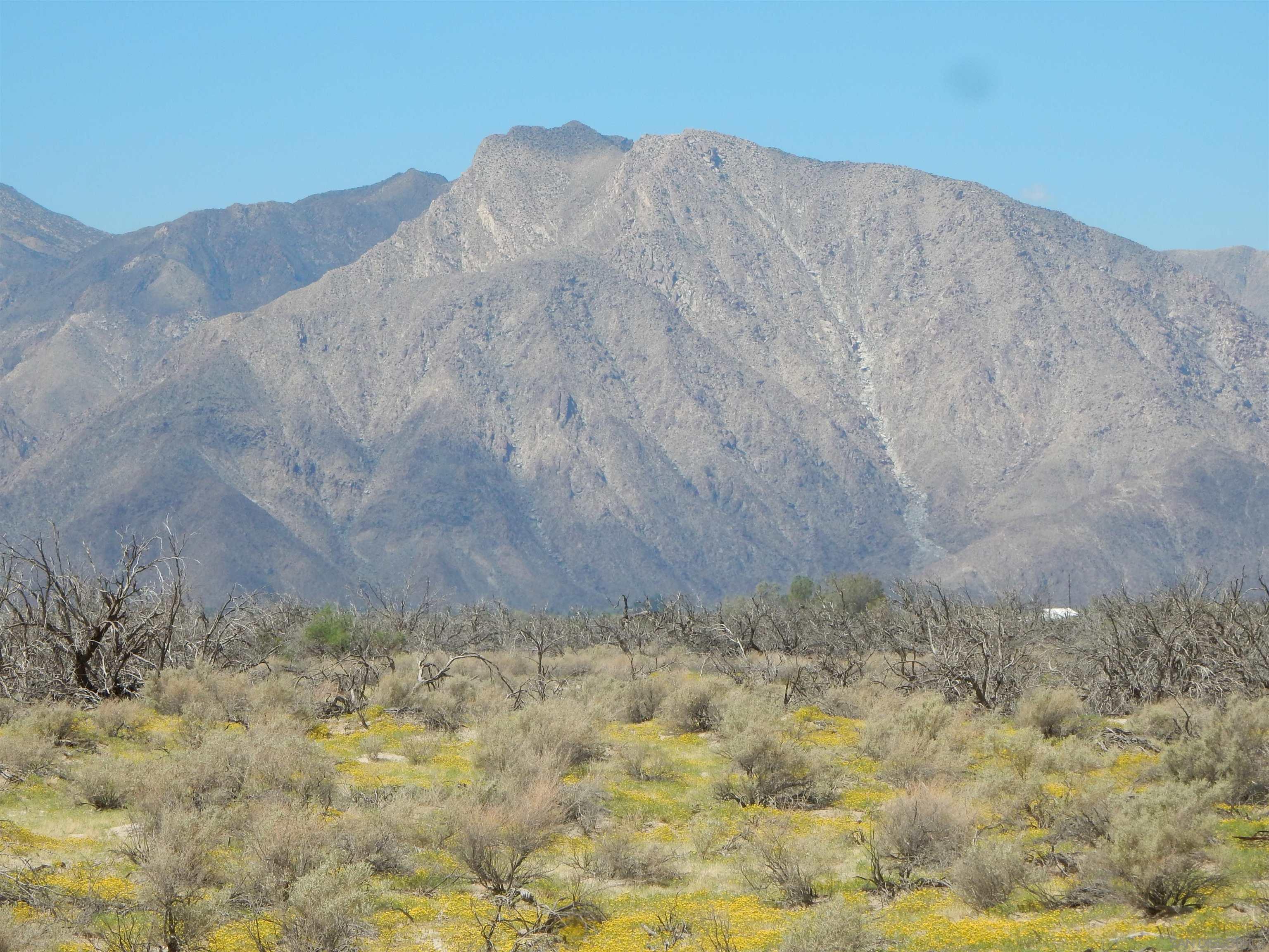 a view of outdoor space and mountains