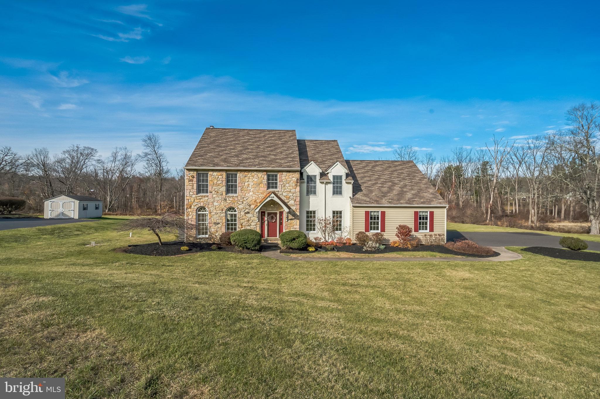 a view of a house with a big yard