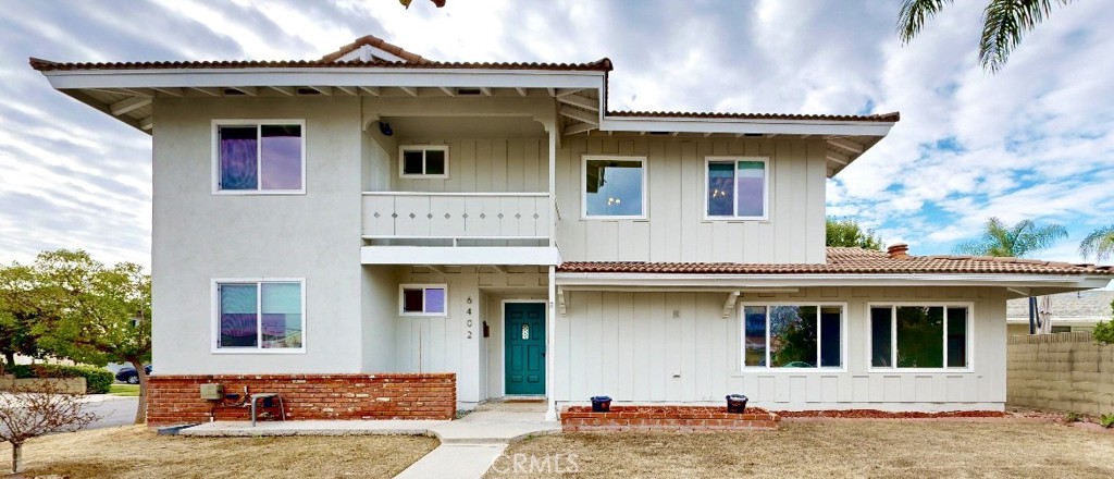 a front view of a house with garage