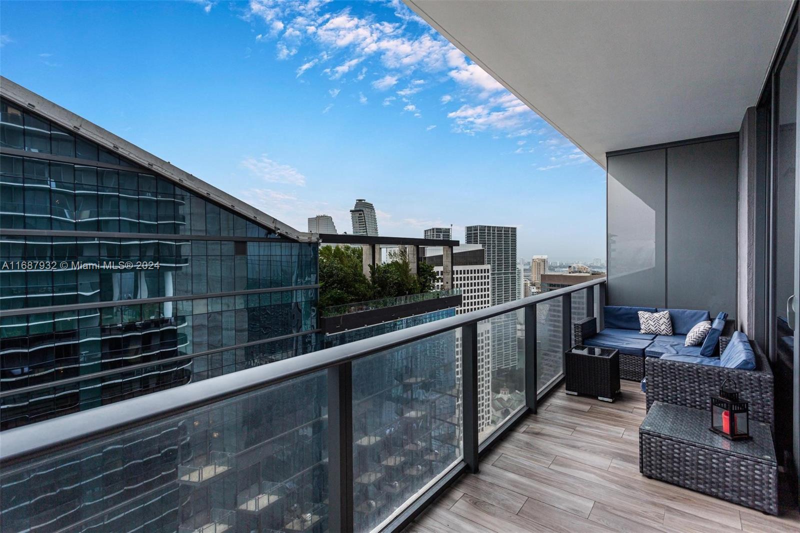 a balcony with hardwood floor