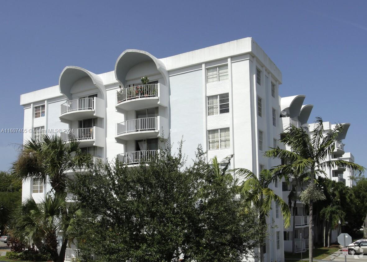 a front view of a multi story residential apartment building