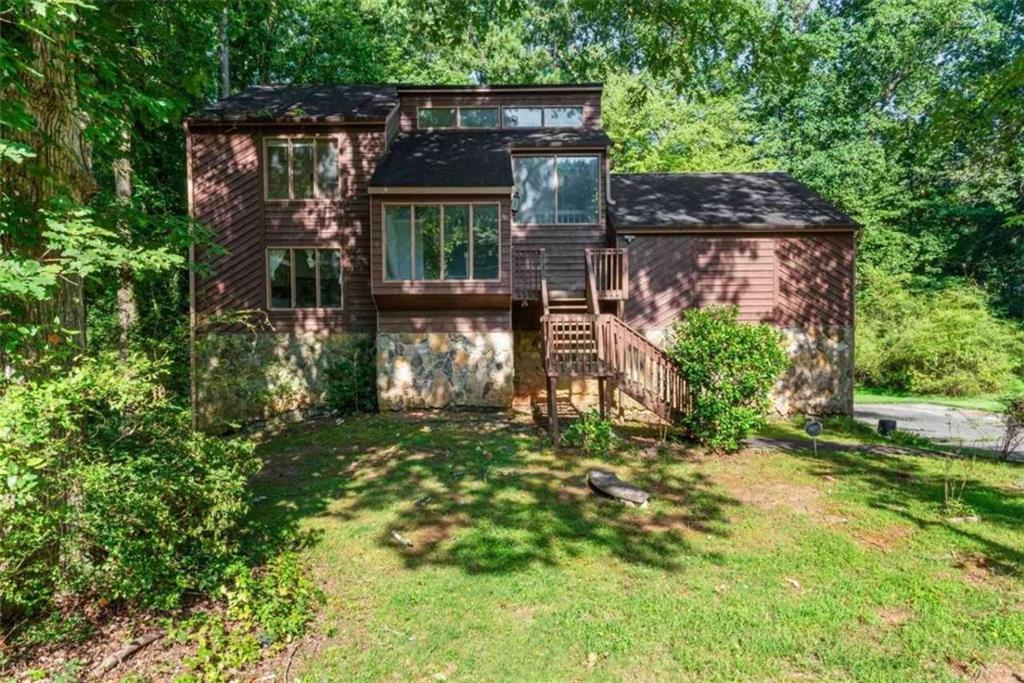 front view of a house with a yard