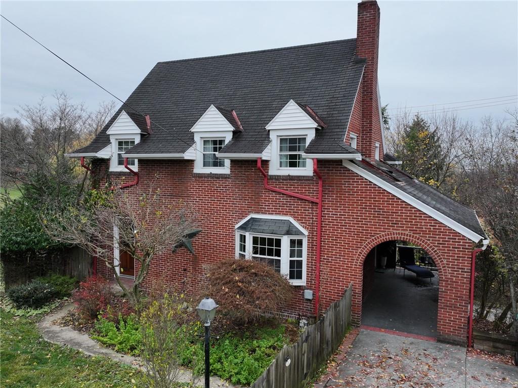 WELCOME TO 2317 MIDDLE ROAD IN INDIANA TOWNSHIP ... A CHARMING BRICK COLONIAL WITH AN EXCEPTIONAL YARD.