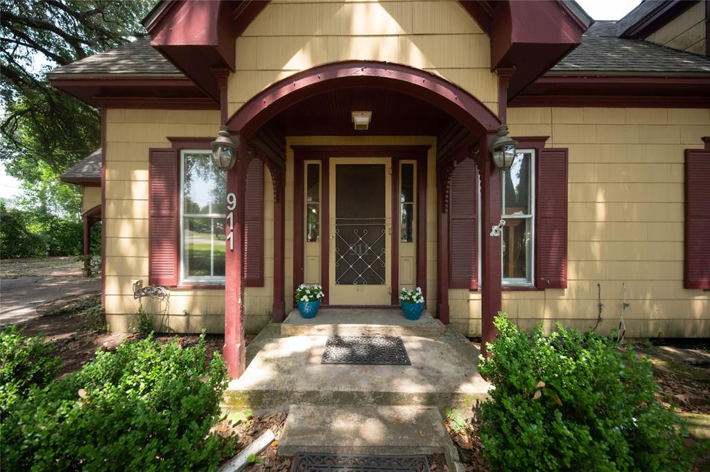 a front view of a house with a porch