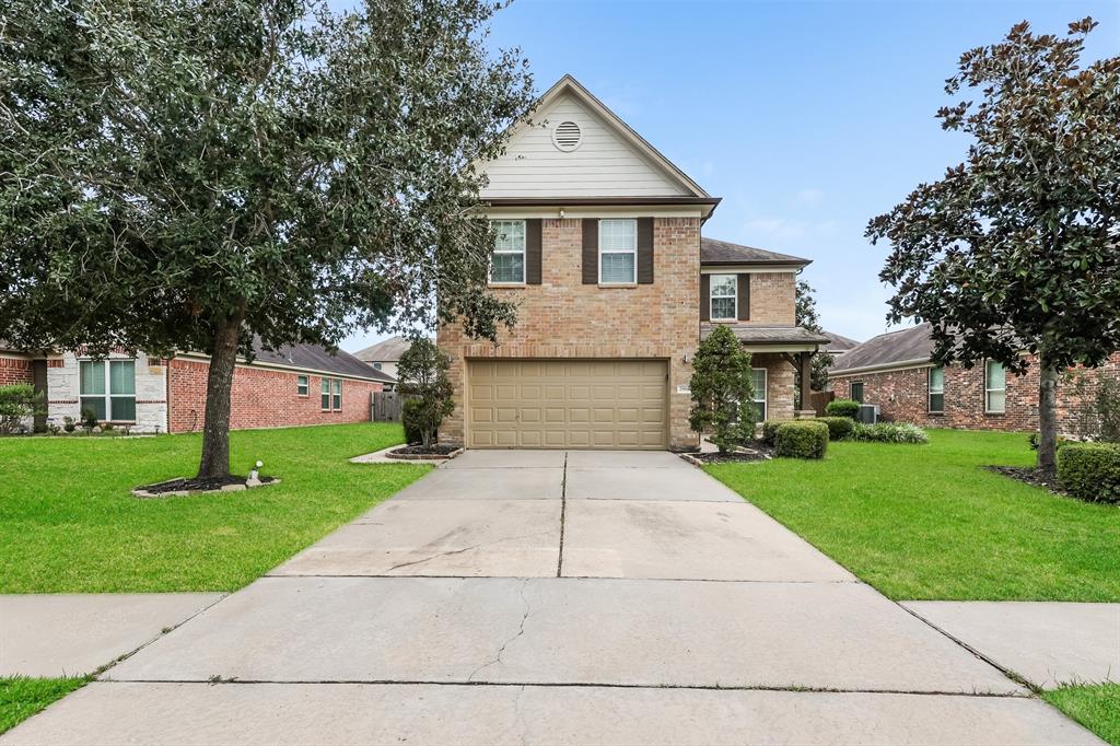 a front view of house with yard