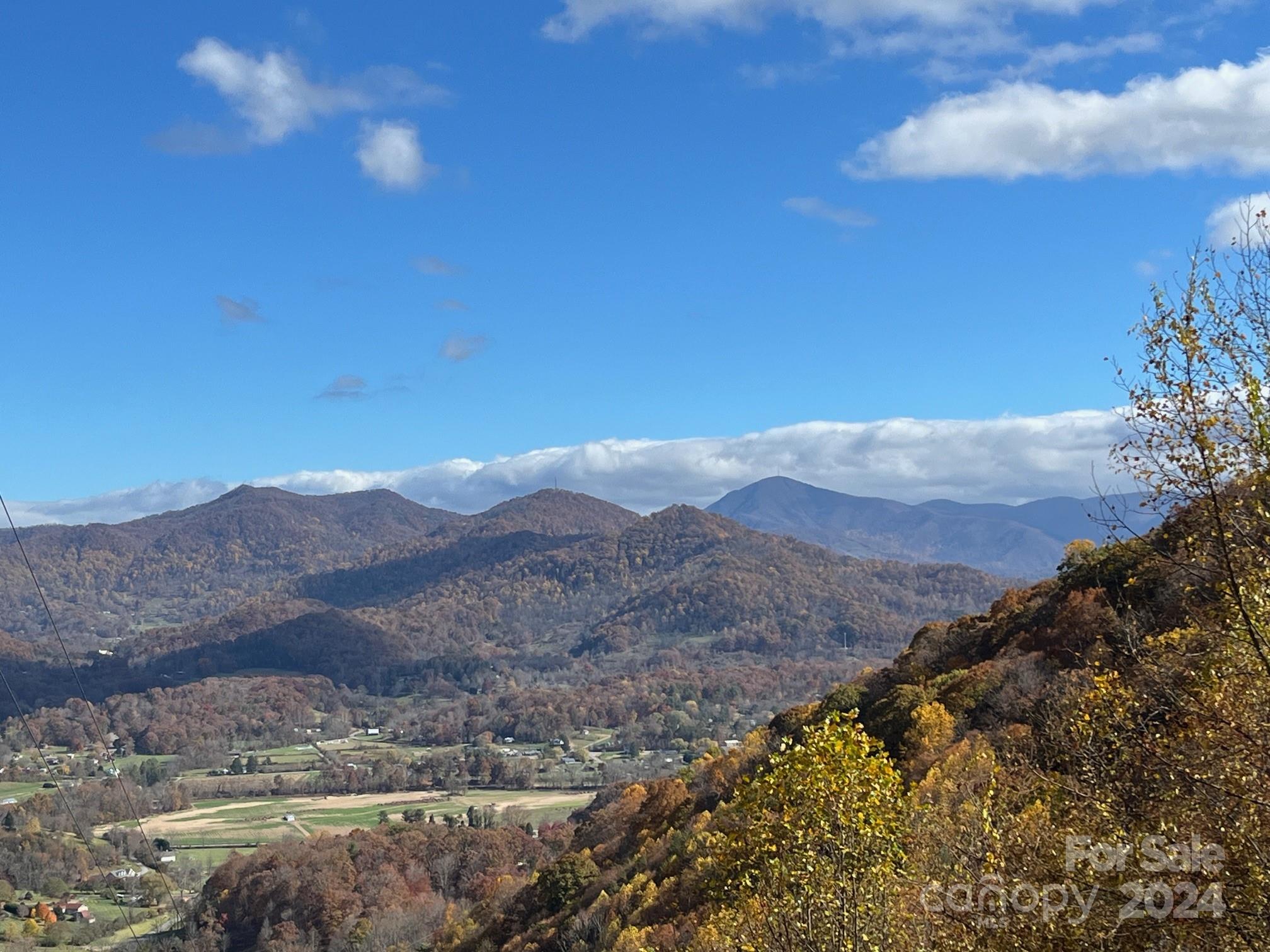 a view of mountains and valleys