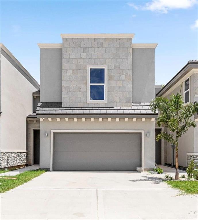 View of front of home with a garage