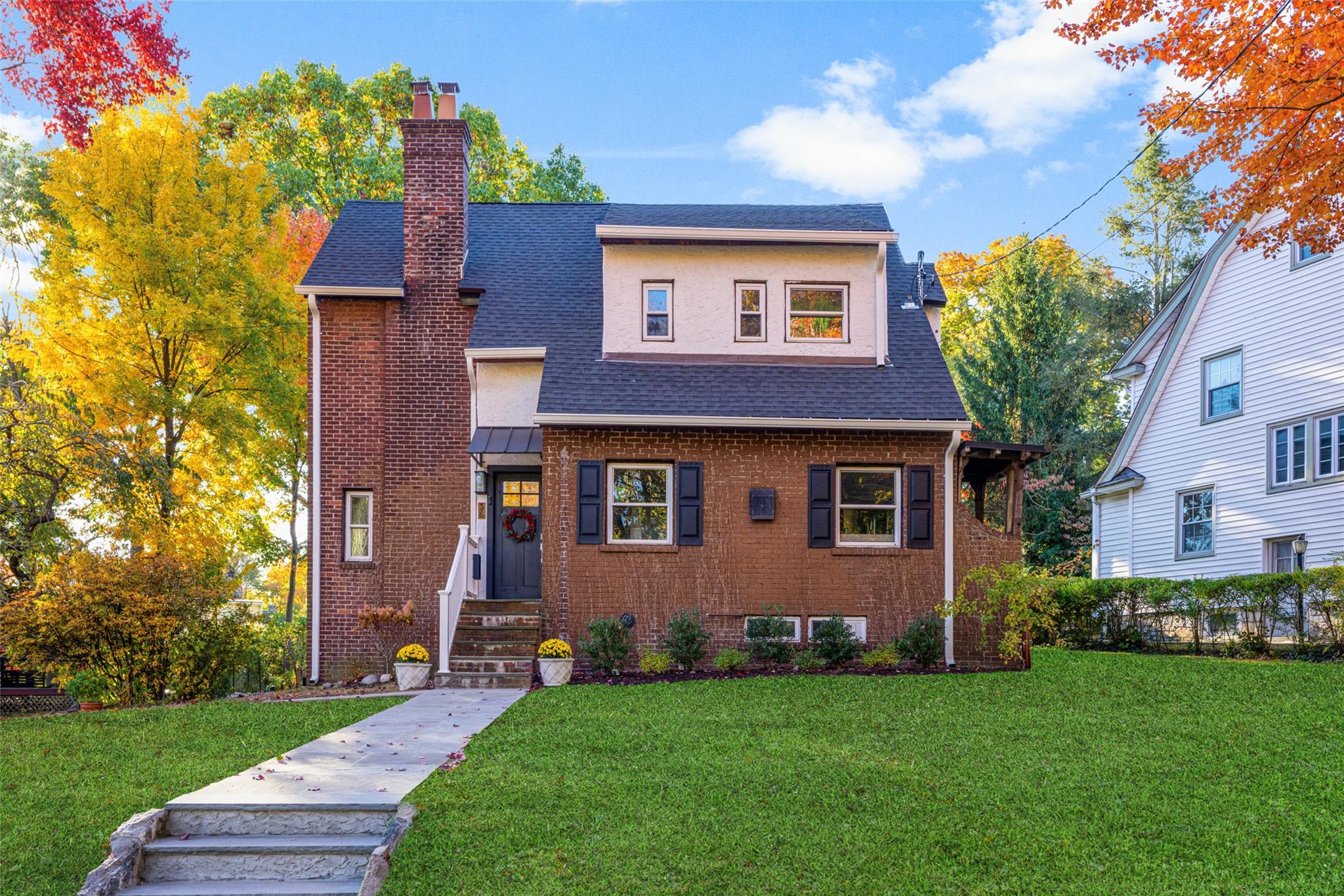 a house view with a garden space