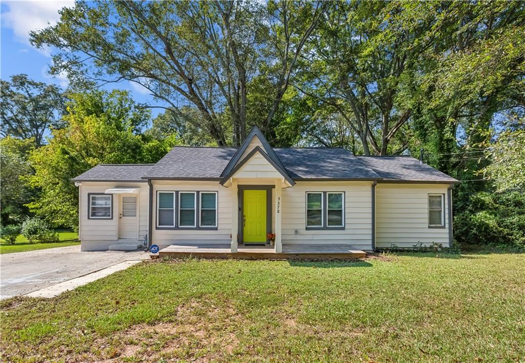 front view of a house with a yard