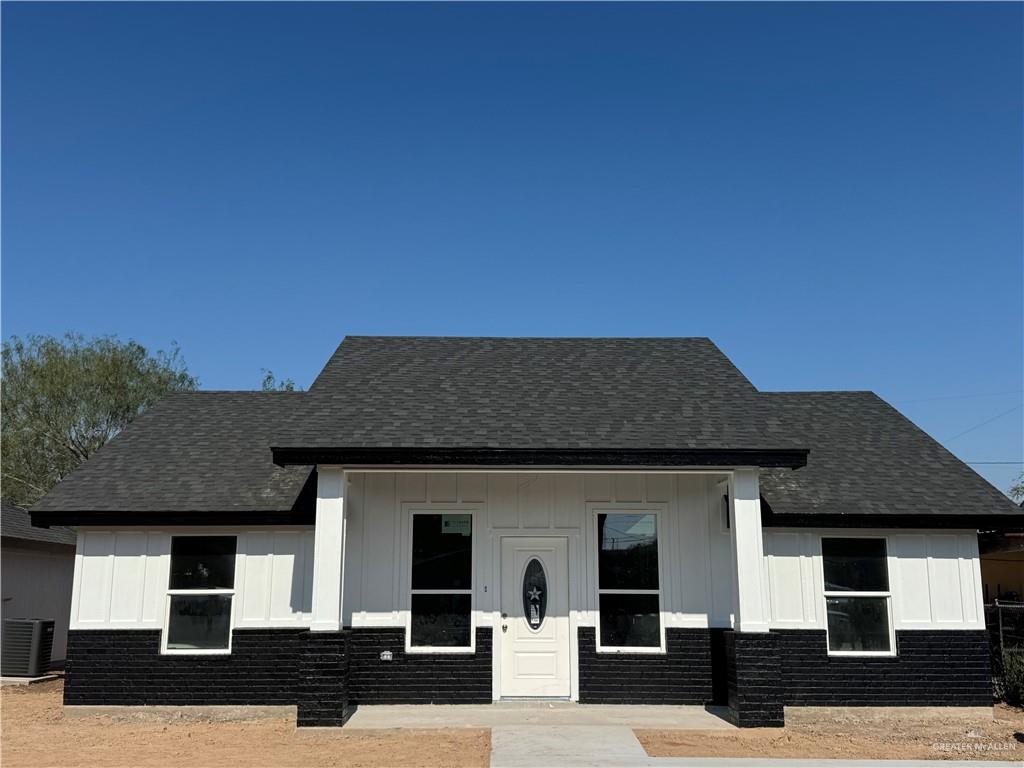 a front view of a house with a garage