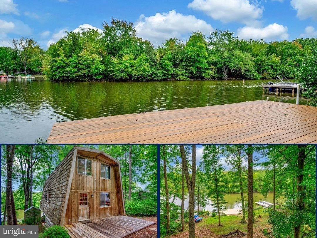 a view of a wooden deck and a lake view