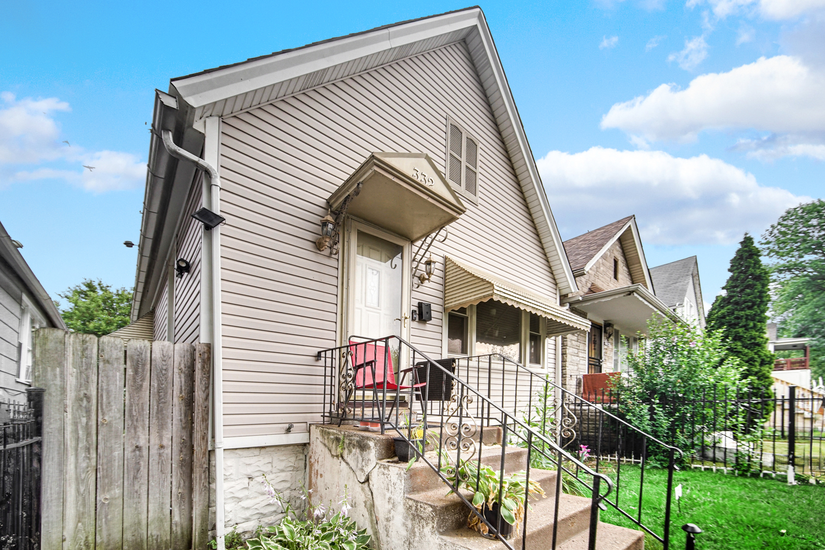 a front view of a house with a porch