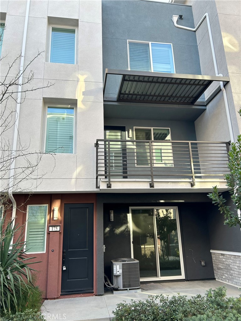 a front view of a house with garage