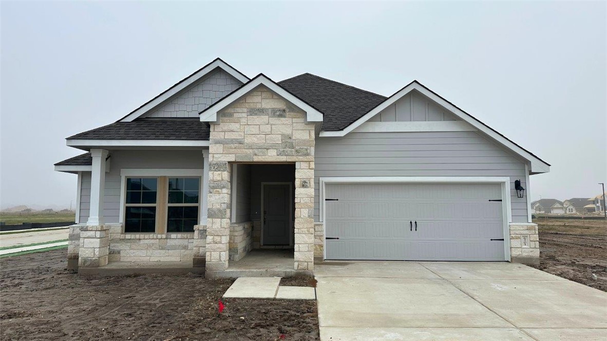 Craftsman house with a garage