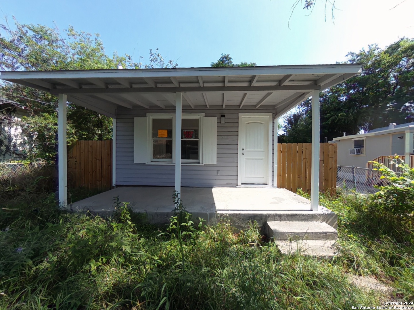 front view of house with a yard