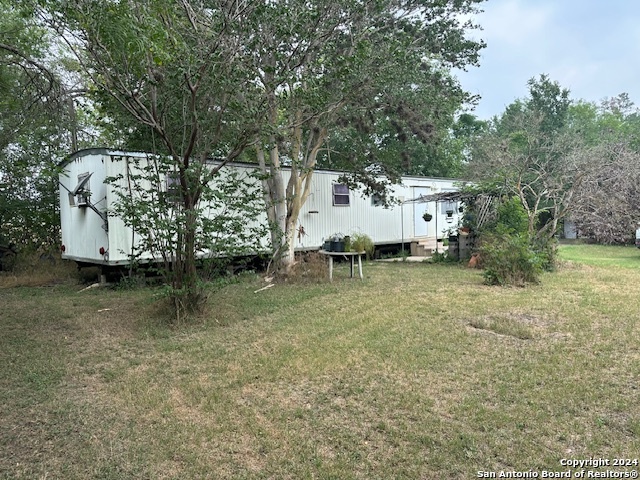 a view of outdoor space and yard