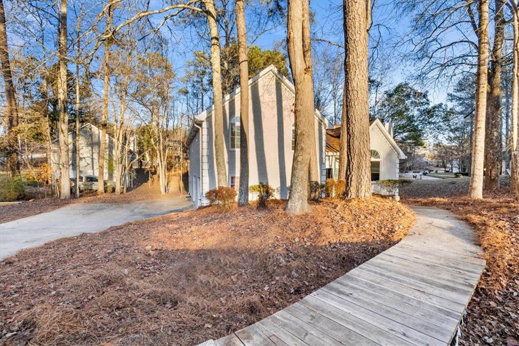 a view of a backyard of the house