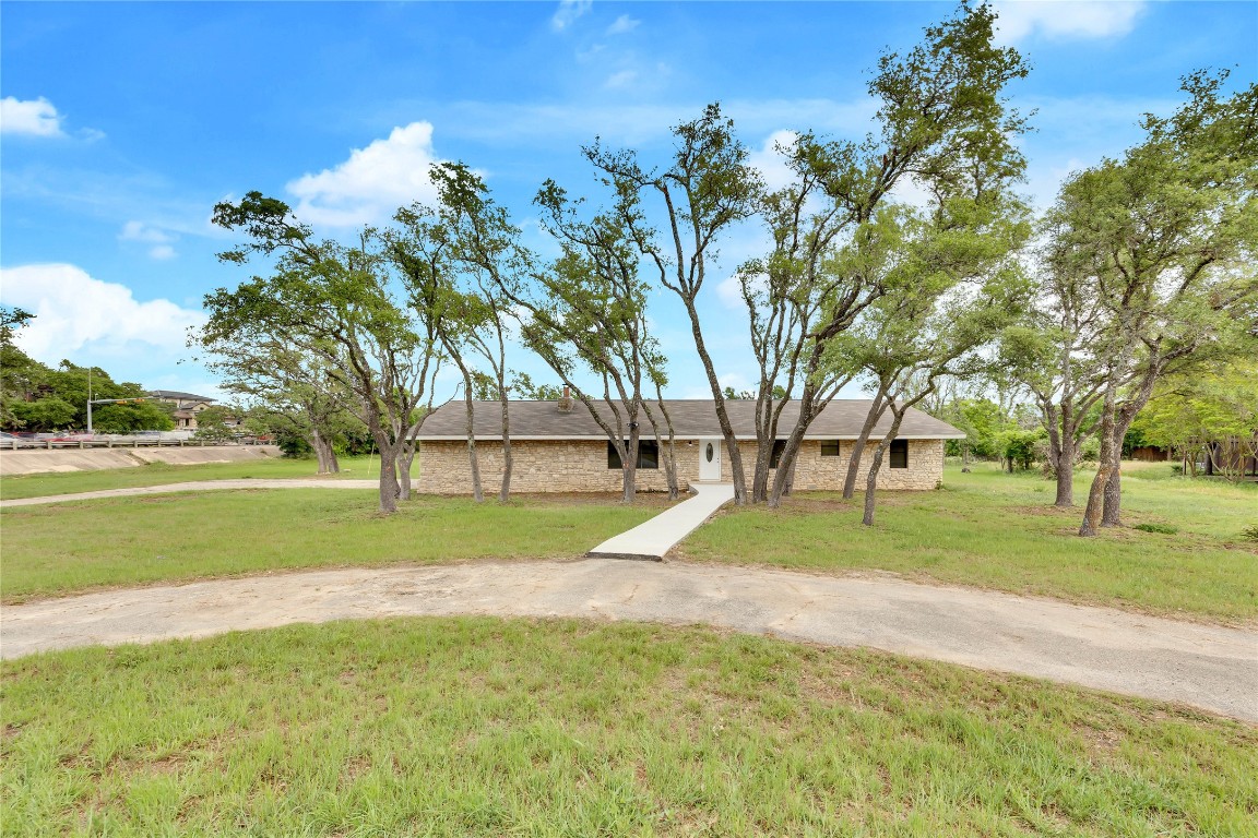 a view of backyard with green space