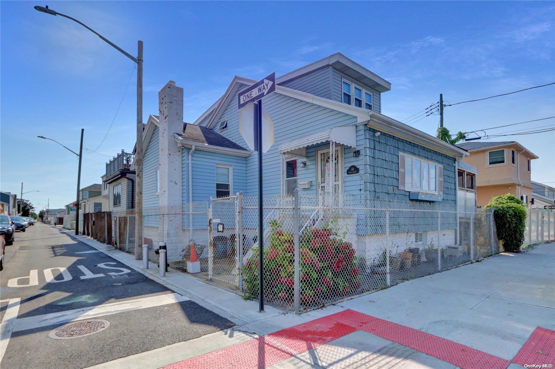 a view of a house with a street