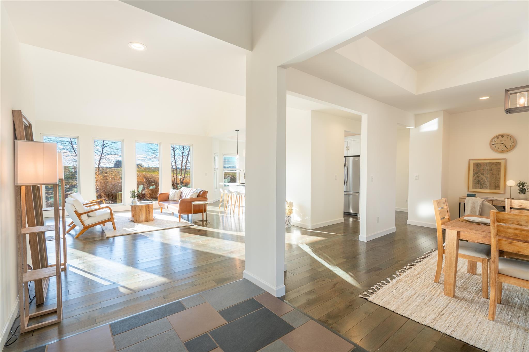 Dining room with dark hardwood / wood-style flooring