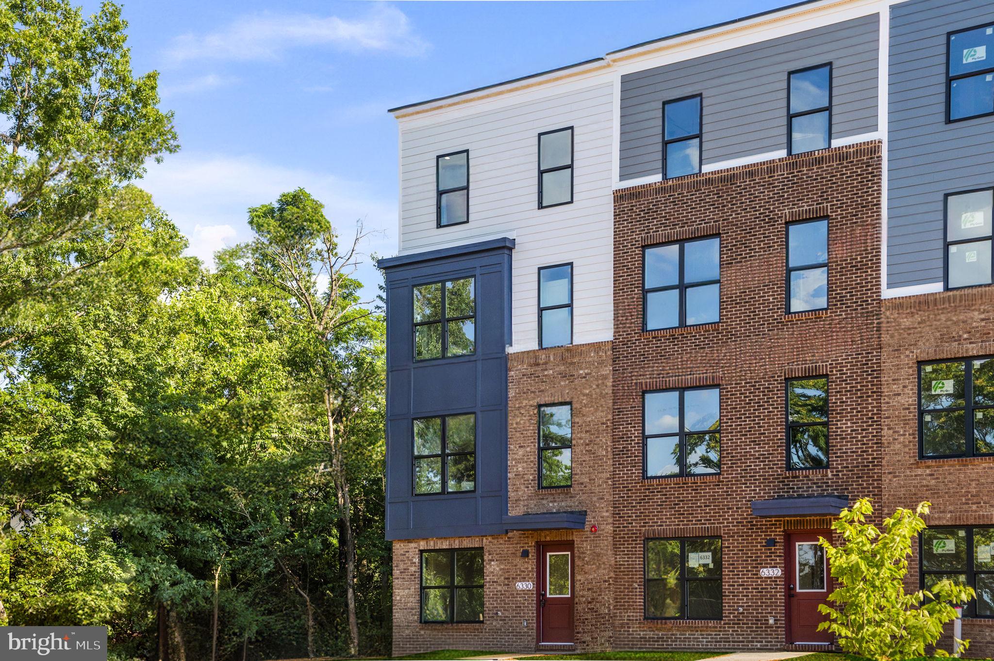 a front view of a multi story residential apartment building