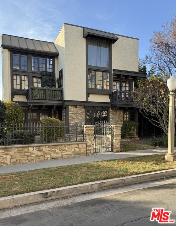 a view of a house with a balcony