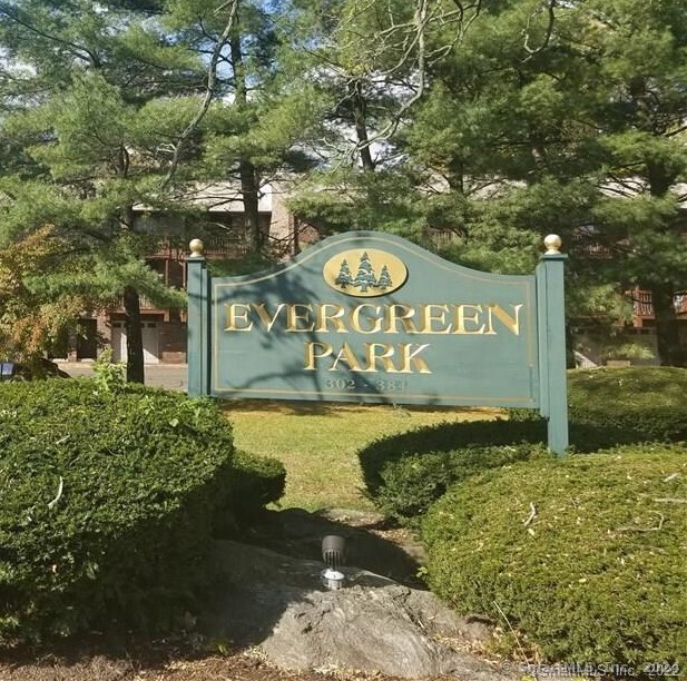 a view of a street with sign board