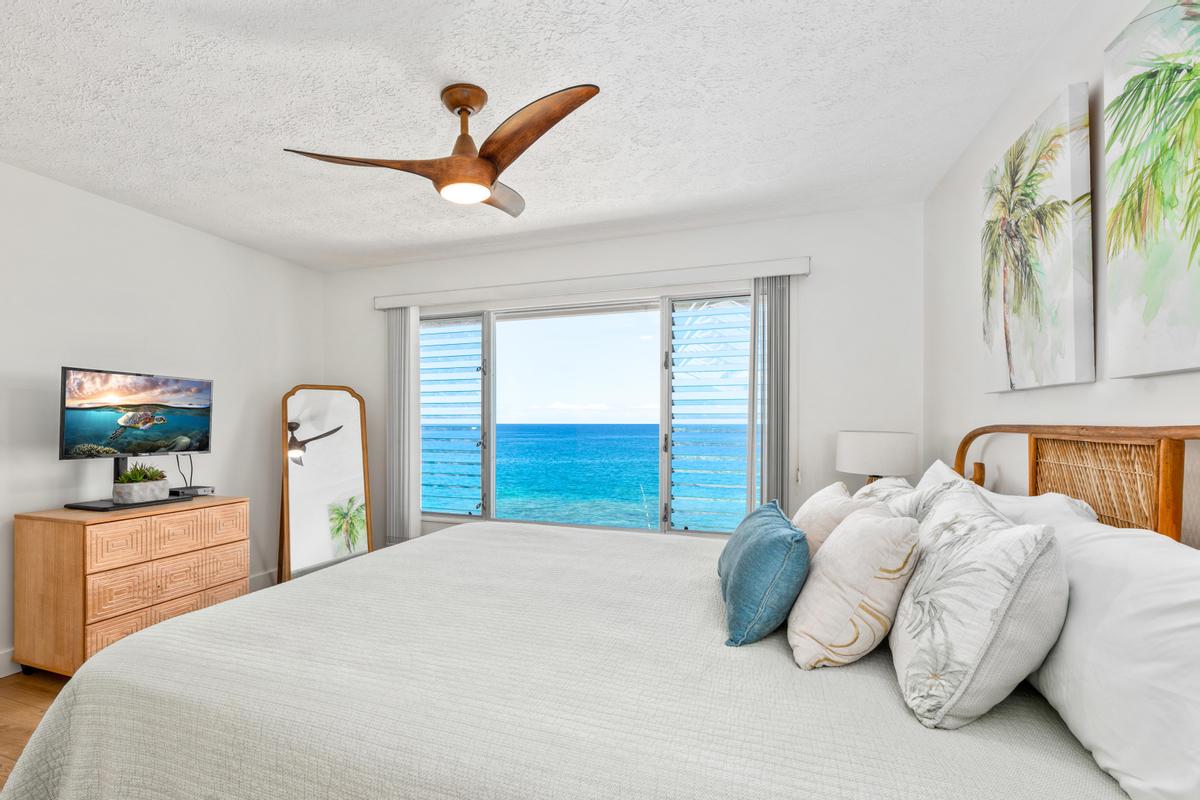 Primary Bedroom - Extra large window to enjoy the beautiful ocean view!   Imagine waking up to this view!