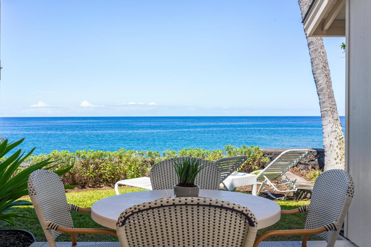 Oceanfront dining at it's best - what a view!   Great lanai area with lots of seating and a grassy area for lounging and taking in the Hawaii vibe