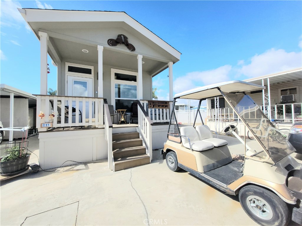 a view of house with outdoor seating