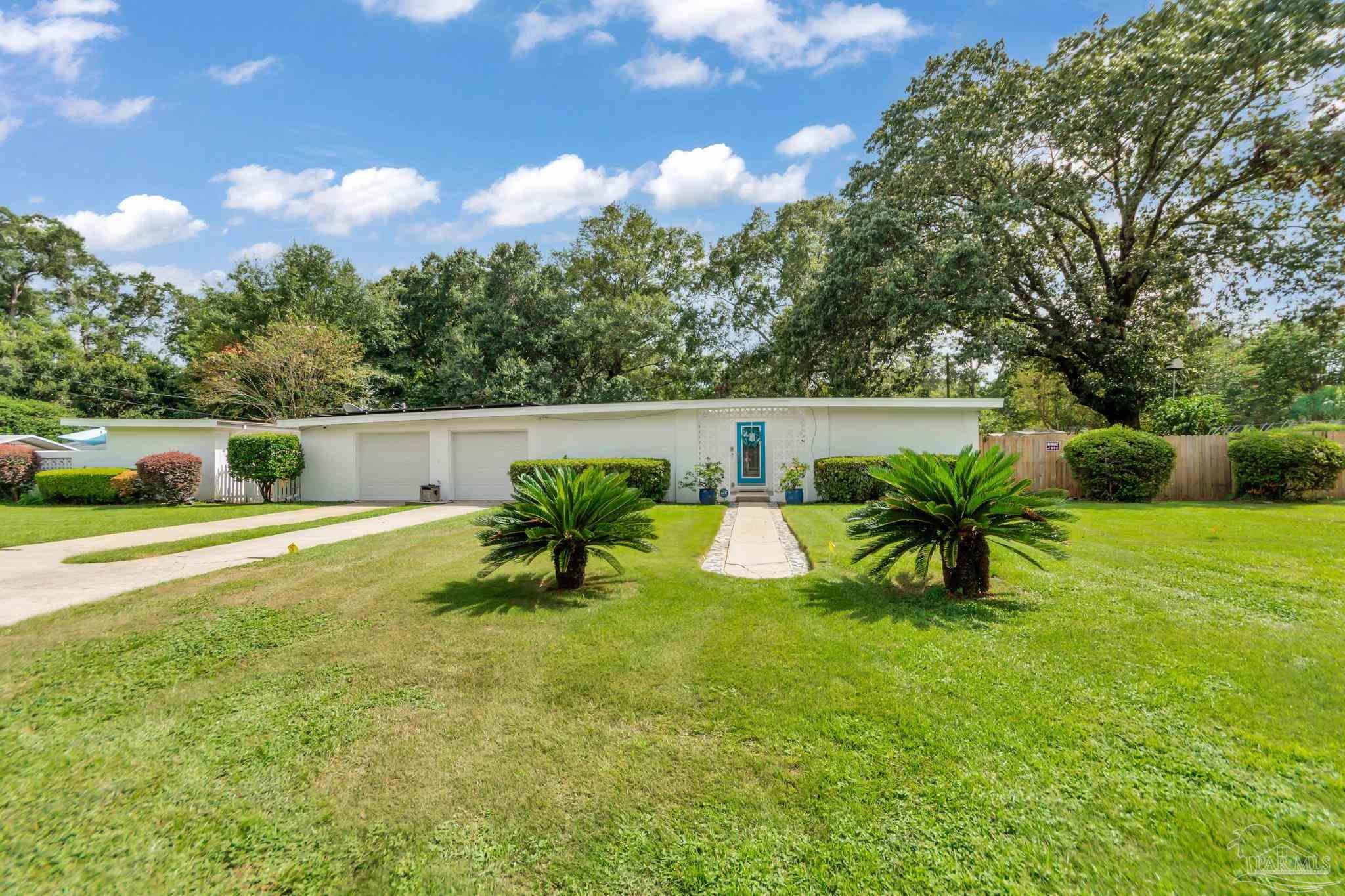 a view of an outdoor space and swimming pool