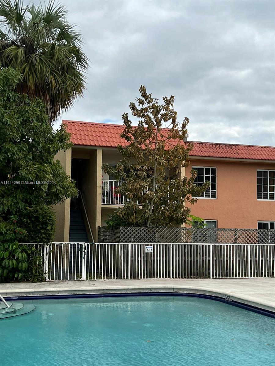 a front view of a house having yard