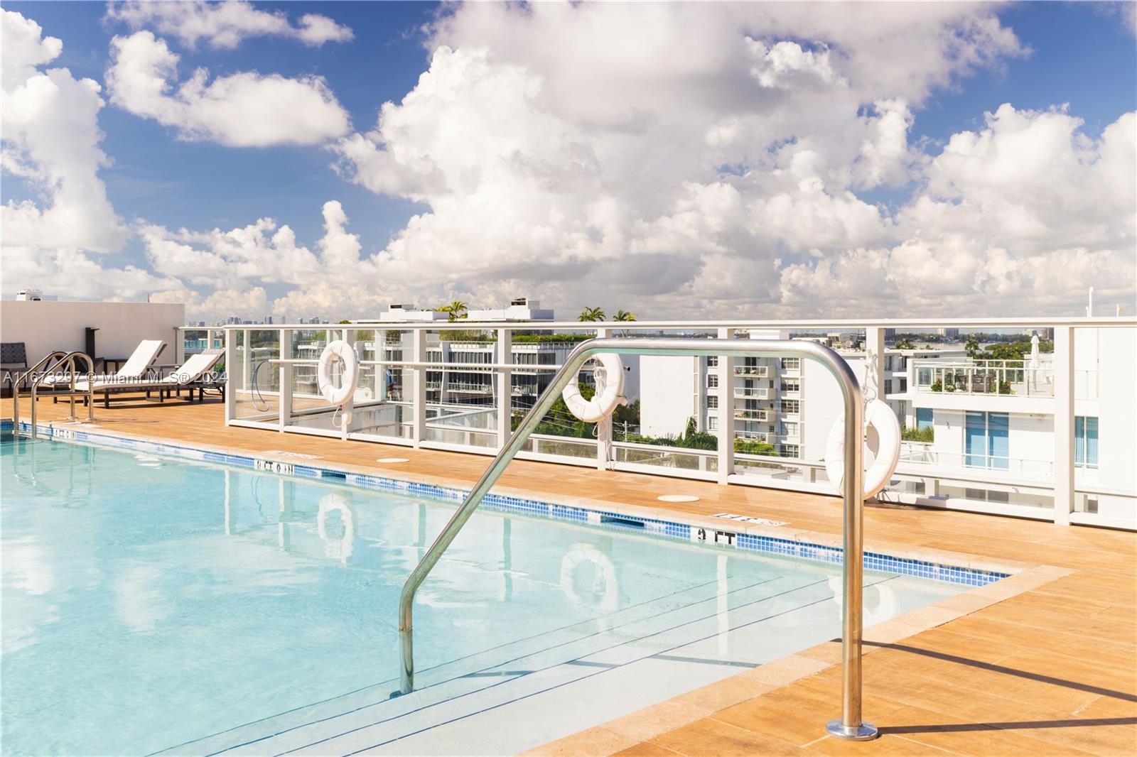 swimming pool with outdoor seating