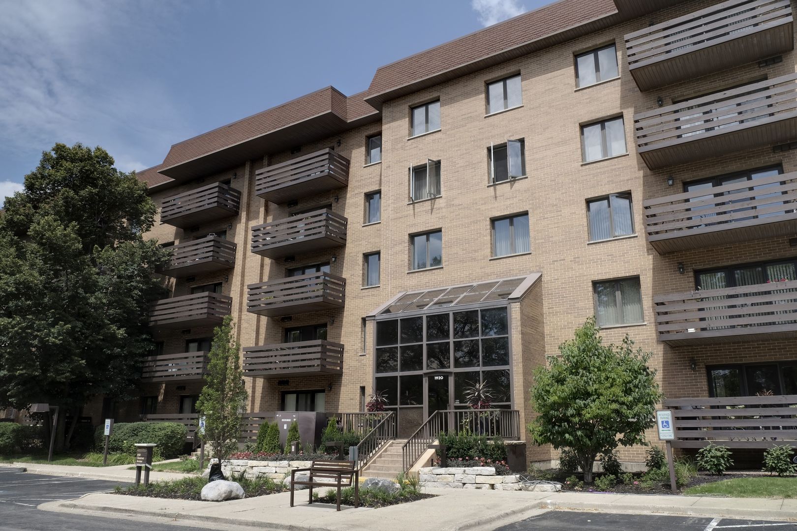 a front view of a building with street view