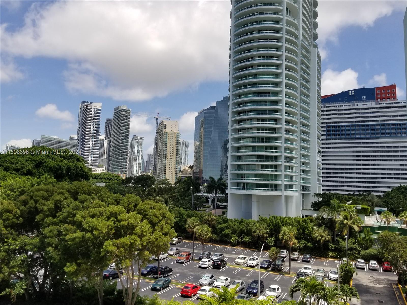 a view of a city with tall buildings