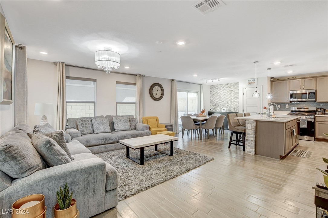 Living room adjacent to Kitchen and formal dining