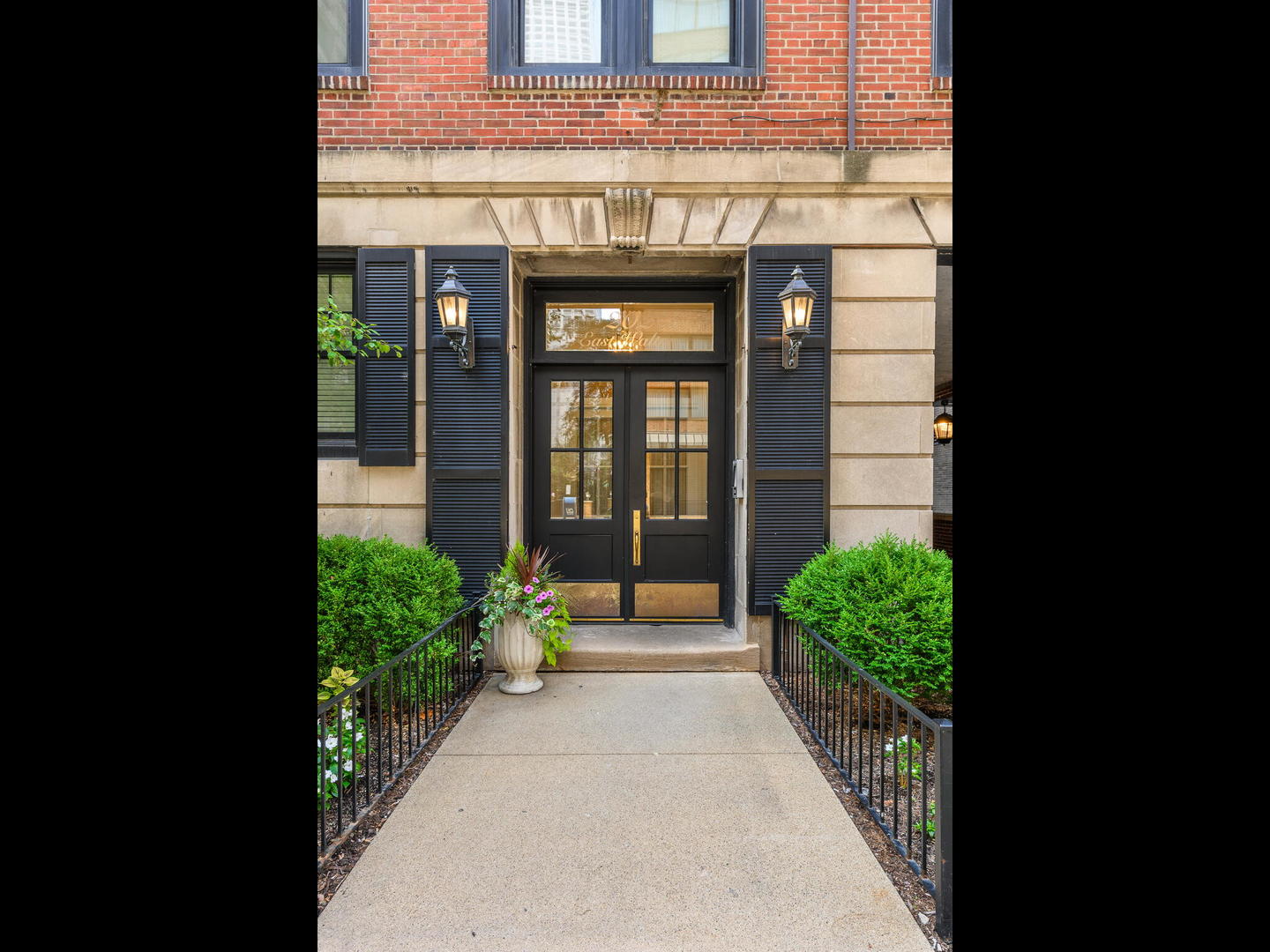 a view of a pathway along the building